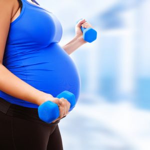 Women exercising with dumbells